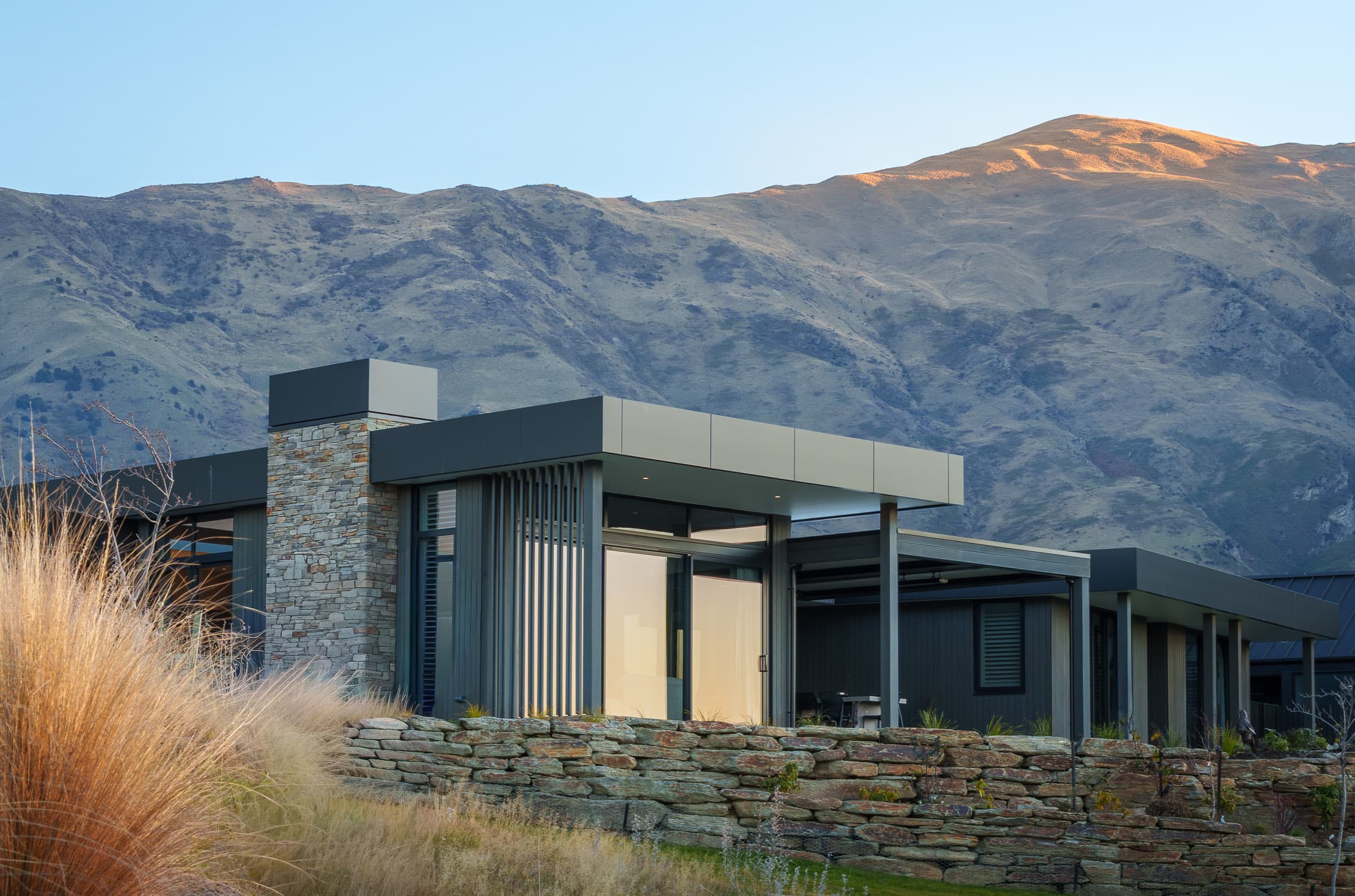 external shot of house with mountain in background